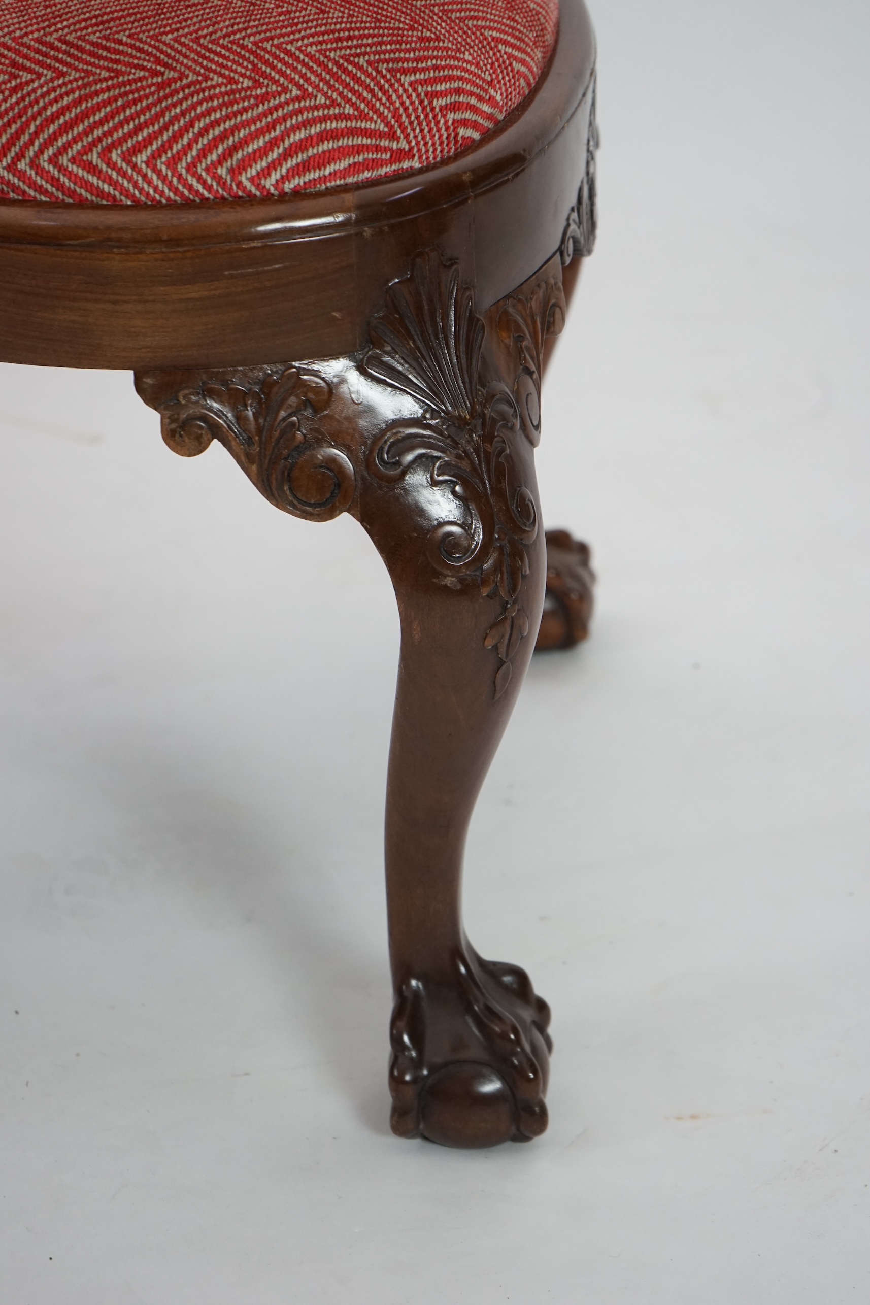 A set of twelve Queen Anne revival walnut dining chairs, including two carvers